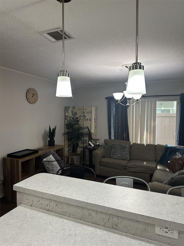 2379 Briarwest Blvd Unit 12, Houston, TX 77077 - living area featuring a textured ceiling