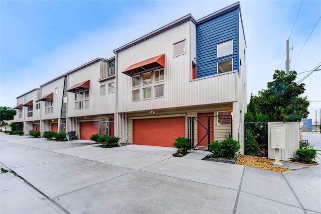 2902 Commerce St, Houston, TX 77003 - view of property featuring an attached garage, driveway, and a residential view