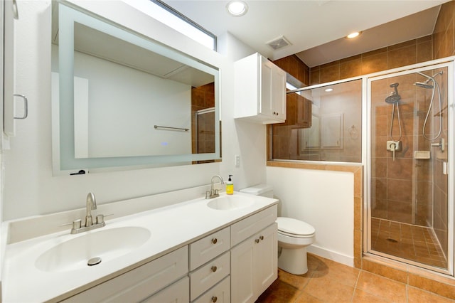 2902 Commerce St, Houston, TX 77003 - full bathroom with double vanity, a stall shower, and tile patterned floors