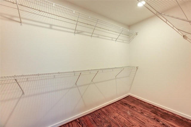 2902 Commerce St, Houston, TX 77003 - spacious closet with dark wood-style floors
