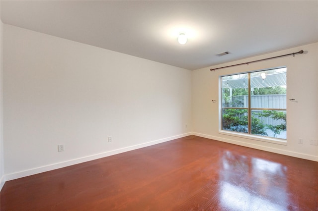2902 Commerce St, Houston, TX 77003 - unfurnished room featuring baseboards and dark wood finished floors