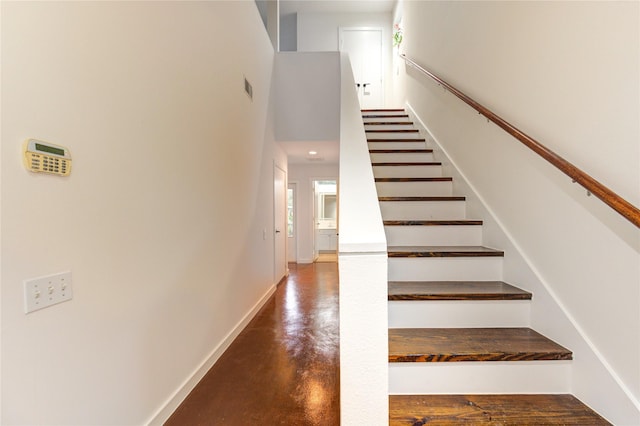 2902 Commerce St, Houston, TX 77003 - staircase with concrete floors and baseboards