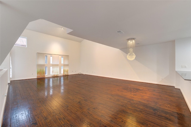 2902 Commerce St, Houston, TX 77003 - unfurnished living room featuring wood-type flooring and baseboards