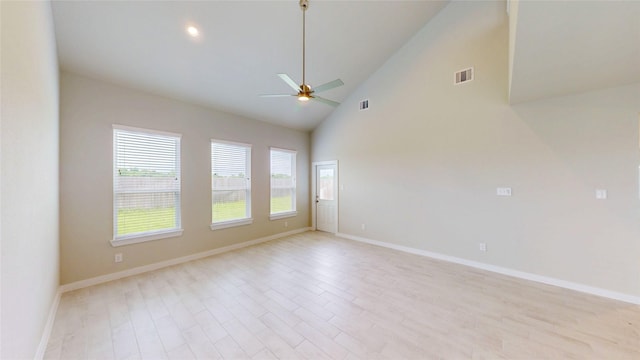 333 Spruce Oak Ln, Waller, TX 77484 - unfurnished room featuring a ceiling fan, light wood-style floors, and high vaulted ceiling