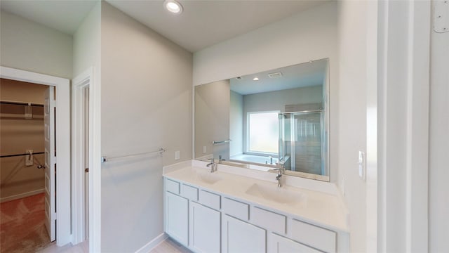 333 Spruce Oak Ln, Waller, TX 77484 - full bath with a walk in closet, a stall shower, a garden tub, double vanity, and recessed lighting