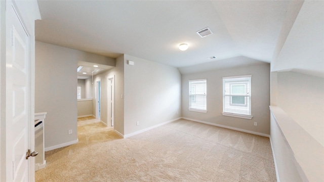 333 Spruce Oak Ln, Waller, TX 77484 - empty room with light carpet, vaulted ceiling, and attic access