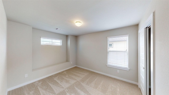 333 Spruce Oak Ln, Waller, TX 77484 - spare room featuring light colored carpet and baseboards