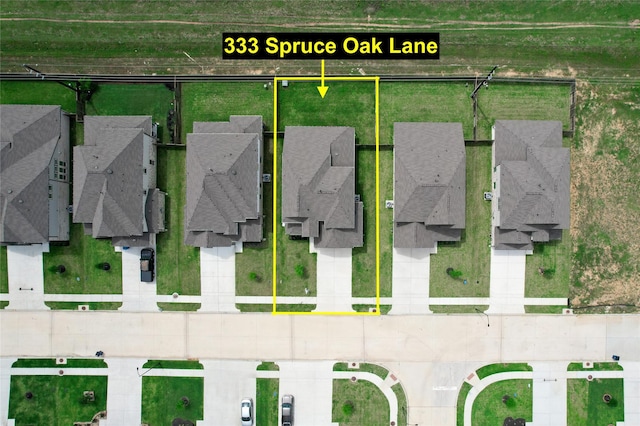 333 Spruce Oak Ln, Waller, TX 77484 - aerial perspective of suburban area featuring property parcel outlined