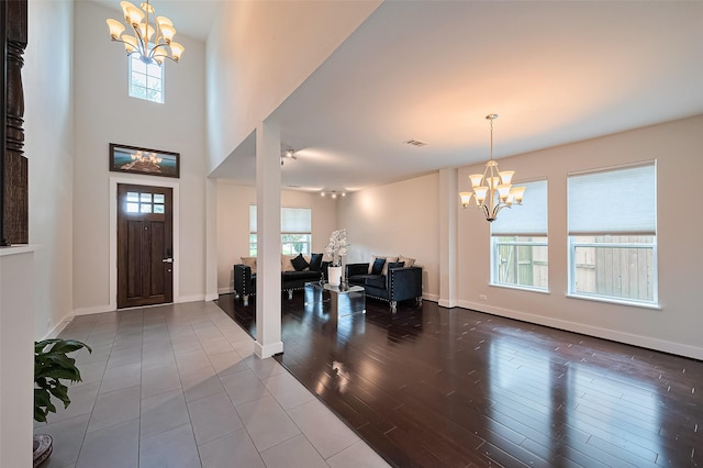 18806 Dove Creek Springs Trl, Cypress, TX 77433 - entrance foyer featuring a chandelier, plenty of natural light, and wood finished floors