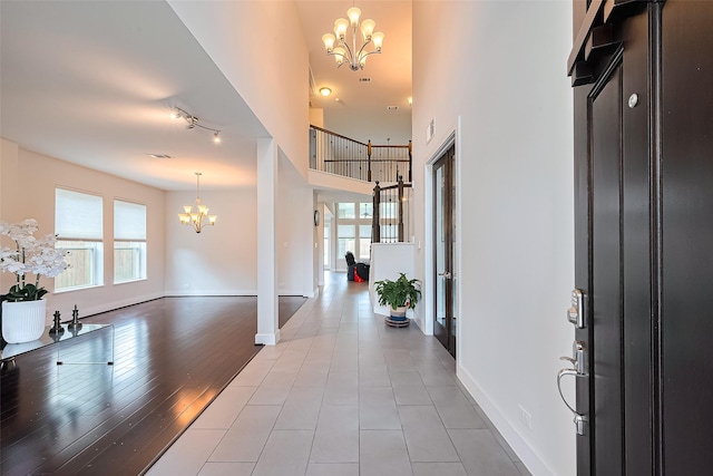 18806 Dove Creek Springs Trl, Cypress, TX 77433 - entryway featuring a chandelier, a high ceiling, and french doors