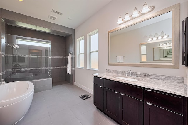 18806 Dove Creek Springs Trl, Cypress, TX 77433 - bathroom with a stall shower, vanity, a soaking tub, and tile patterned flooring