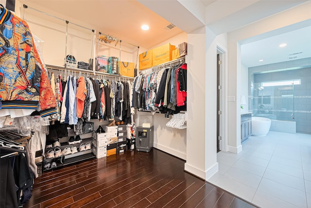 18806 Dove Creek Springs Trl, Cypress, TX 77433 - spacious closet featuring wood finished floors