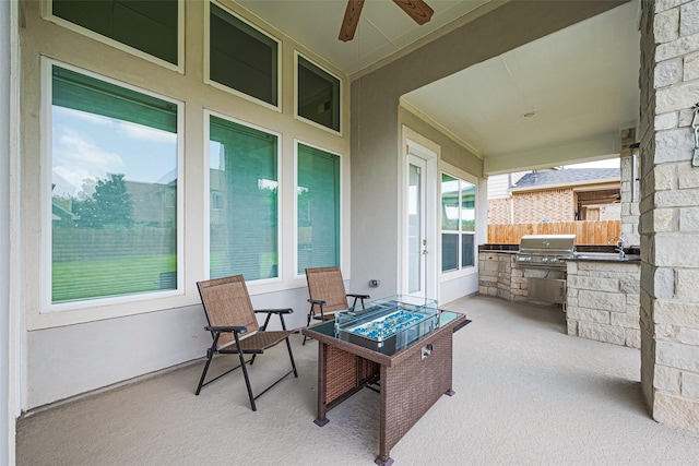 18806 Dove Creek Springs Trl, Cypress, TX 77433 - view of patio / terrace featuring area for grilling, an outdoor fire pit, and a ceiling fan