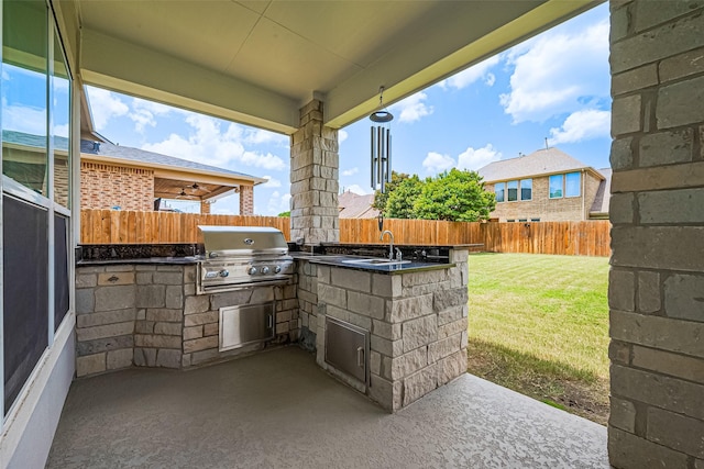 18806 Dove Creek Springs Trl, Cypress, TX 77433 - fenced backyard with exterior kitchen and a patio area