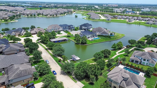 18806 Dove Creek Springs Trl, Cypress, TX 77433 - aerial perspective of suburban area with a large body of water