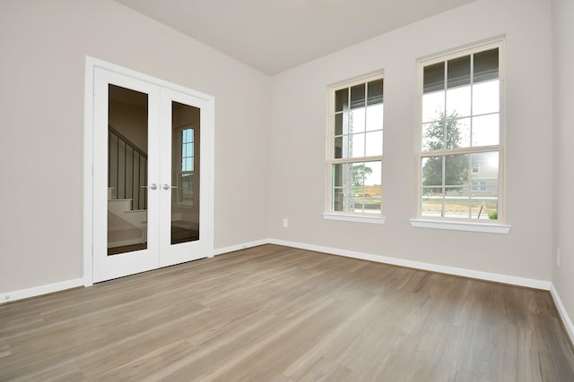 22006 Big Sky Dr, Tomball, TX 77375 - empty room with wood finished floors and baseboards