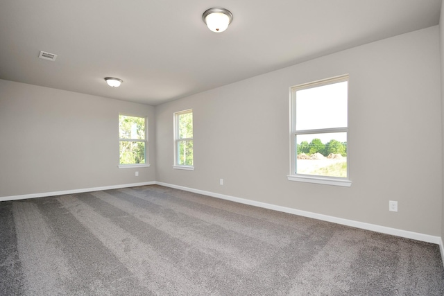 22006 Big Sky Dr, Tomball, TX 77375 - empty room featuring carpet floors and baseboards