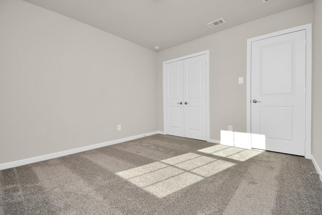 22006 Big Sky Dr, Tomball, TX 77375 - unfurnished bedroom with carpet flooring and a closet