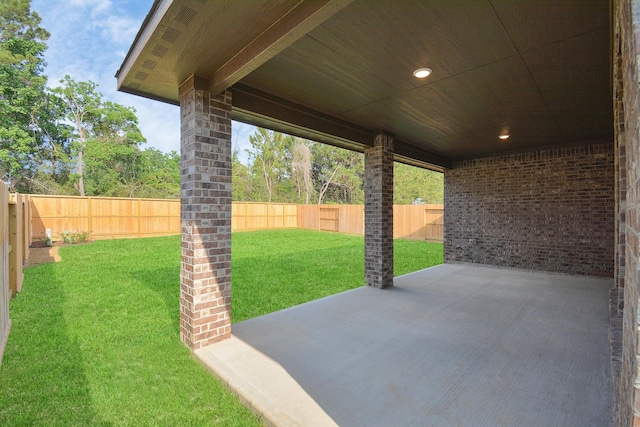 22006 Big Sky Dr, Tomball, TX 77375 - fenced backyard with a patio area