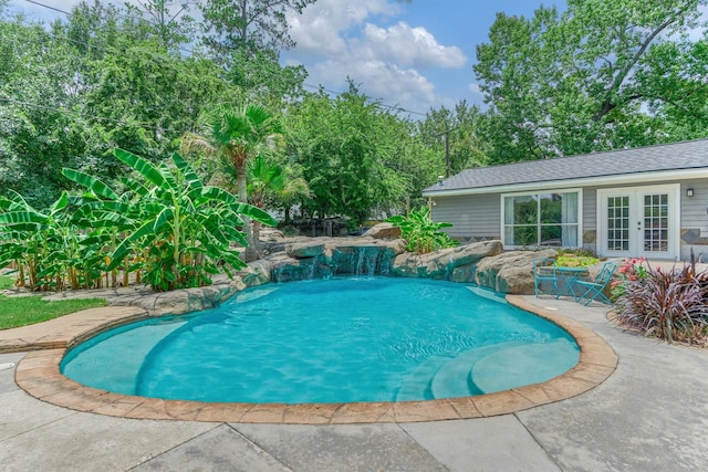 6103 Allentown Dr, Spring, TX 77389 - swimming pool featuring french doors and a patio area