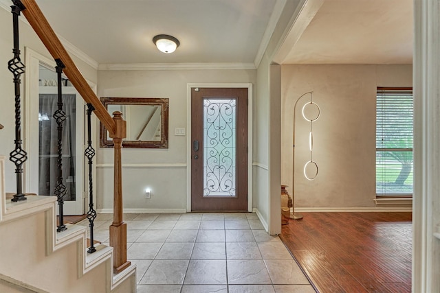 6103 Allentown Dr, Spring, TX 77389 - foyer entrance with stairway, ornamental molding, and light wood-style flooring