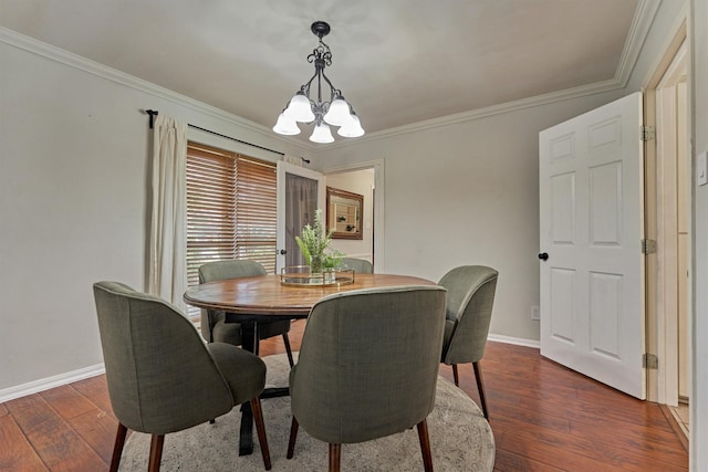 6103 Allentown Dr, Spring, TX 77389 - dining area with a chandelier, dark wood-style flooring, and ornamental molding