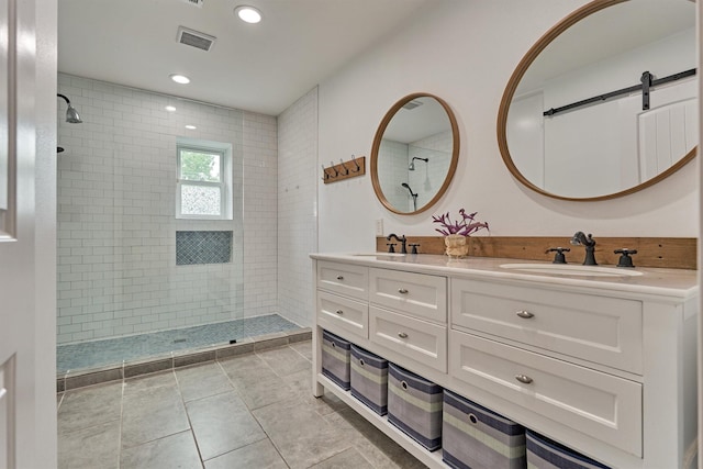 6103 Allentown Dr, Spring, TX 77389 - full bath featuring walk in shower, double vanity, tile patterned flooring, and recessed lighting