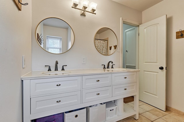 6103 Allentown Dr, Spring, TX 77389 - full bathroom featuring double vanity and tile patterned floors