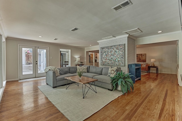 6103 Allentown Dr, Spring, TX 77389 - living area featuring ornamental molding, wood finished floors, french doors, recessed lighting, and attic access