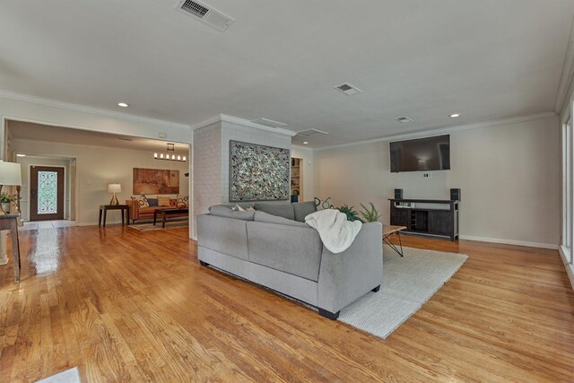 6103 Allentown Dr, Spring, TX 77389 - living room with light wood-style floors, crown molding, and recessed lighting