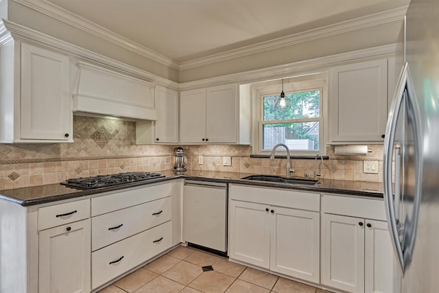 6103 Allentown Dr, Spring, TX 77389 - kitchen featuring stainless steel refrigerator, gas stovetop, dishwashing machine, dark stone counters, and light tile patterned floors