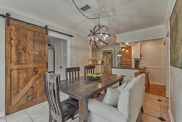 6103 Allentown Dr, Spring, TX 77389 - dining space featuring a barn door, light tile patterned floors, ornamental molding, and a chandelier