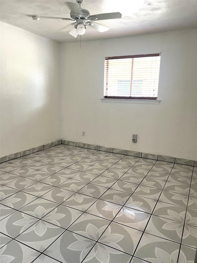 12332 Kayla Ln, Houston, TX 77015 - unfurnished room with a ceiling fan, light tile patterned floors, and a smoke detector