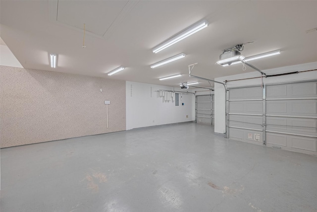 8812 Snowy Owl Loop, Missouri City, TX 77459 - garage with a garage door opener