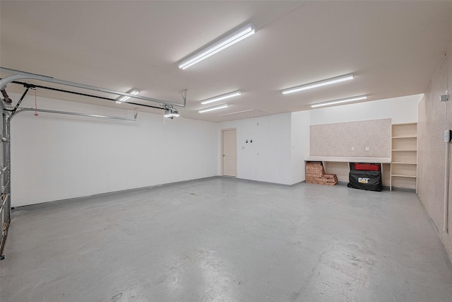 8812 Snowy Owl Loop, Missouri City, TX 77459 - garage featuring a garage door opener