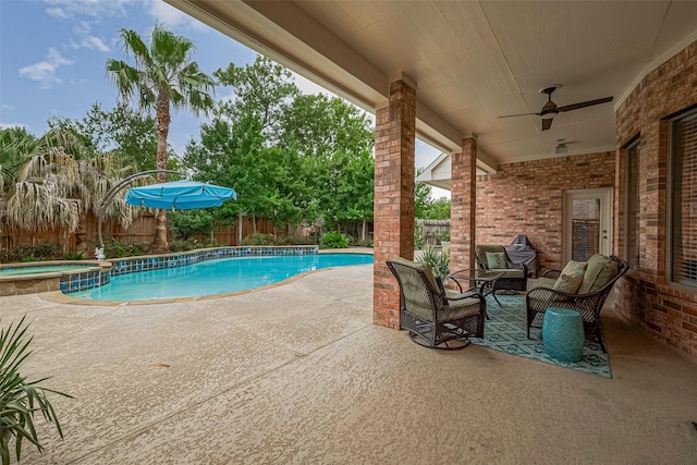 8812 Snowy Owl Loop, Missouri City, TX 77459 - view of pool with a patio area, a fenced backyard, a pool with connected hot tub, and ceiling fan
