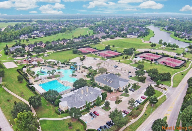 8812 Snowy Owl Loop, Missouri City, TX 77459 - bird's eye view of a large body of water and a pool