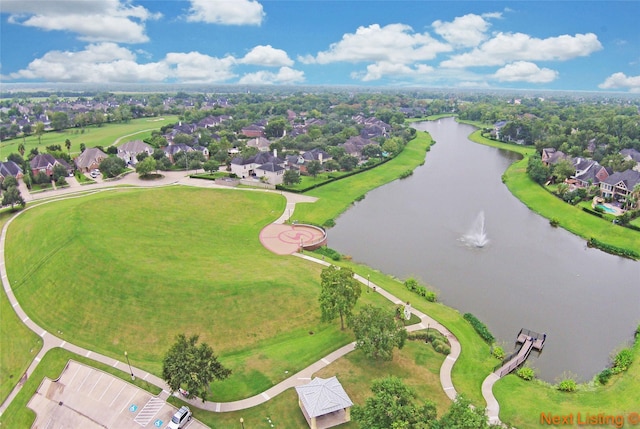 8812 Snowy Owl Loop, Missouri City, TX 77459 - aerial perspective of suburban area featuring a nearby body of water
