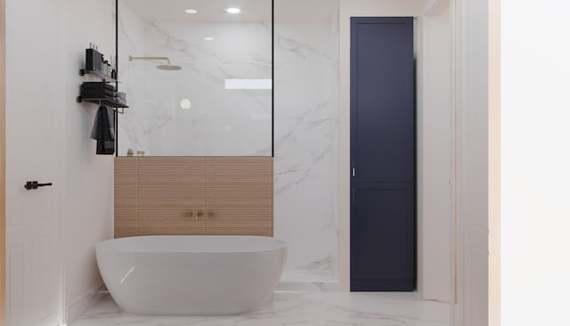 2428 Ella Blvd, Houston, TX 77008 - full bathroom with marble tiled floors, a soaking tub, a marble finish shower, and recessed lighting