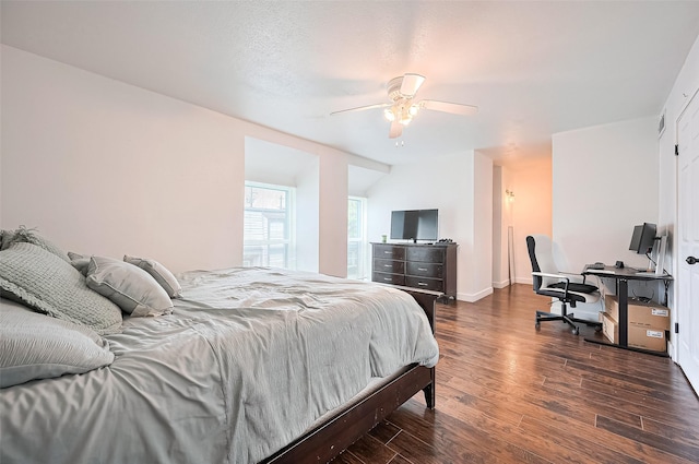 10174 Beekman Place Dr, Houston, TX 77043 - bedroom featuring wood finished floors, a ceiling fan, and an office area