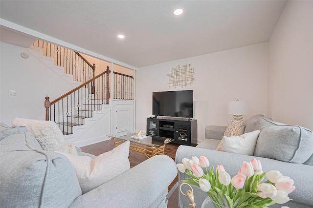 10174 Beekman Place Dr, Houston, TX 77043 - living area featuring stairs, wood finished floors, and recessed lighting