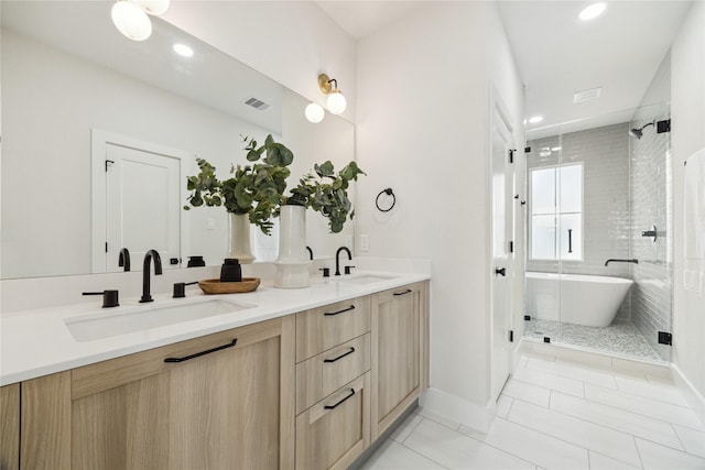 3911B Tulane St, Houston, TX 77018 - full bath featuring double vanity, a shower stall, a freestanding bath, and recessed lighting