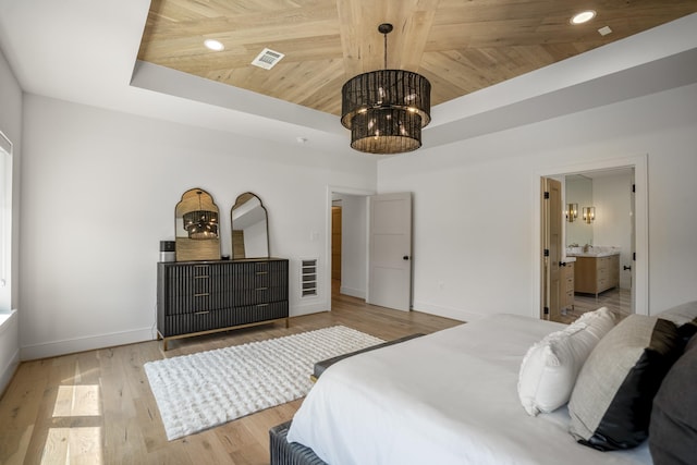 4991 Dumfries Dr, Houston, TX 77096 - bedroom featuring wooden ceiling, a chandelier, light wood-type flooring, connected bathroom, and recessed lighting