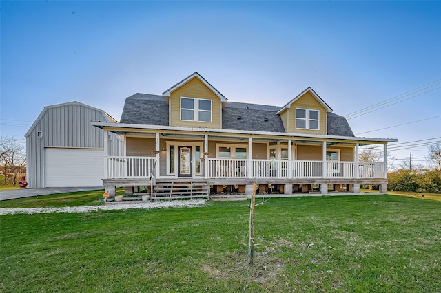 206 S Idaho St, La Porte, TX 77571 - view of front of property with a shingled roof, a porch, an outdoor structure, and a front lawn