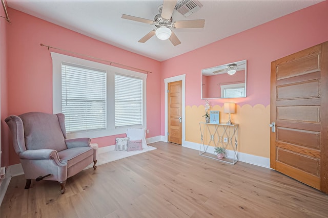 206 S Idaho St, La Porte, TX 77571 - sitting room featuring wood finished floors and ceiling fan