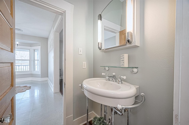 206 S Idaho St, La Porte, TX 77571 - bathroom featuring baseboards