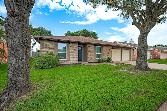 19718 Franz Rd, Houston, TX 77084 - ranch-style house featuring an attached garage, brick siding, driveway, and a front yard