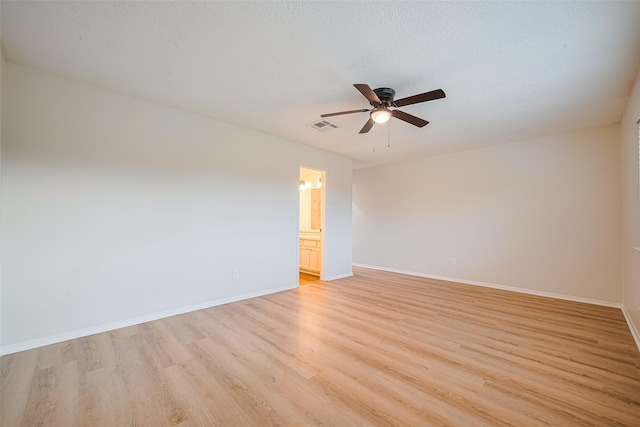 19718 Franz Rd, Houston, TX 77084 - spare room with light wood-style floors and a ceiling fan