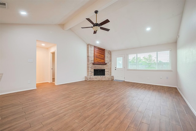 19718 Franz Rd, Houston, TX 77084 - unfurnished living room featuring a ceiling fan, light wood finished floors, a brick fireplace, and recessed lighting