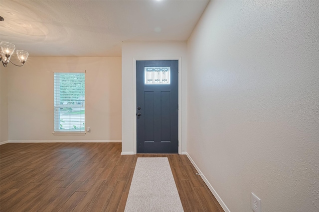 19718 Franz Rd, Houston, TX 77084 - foyer entrance with dark wood finished floors and a chandelier